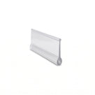 Clear bifold seal offcut angled on white, flat blade body with a small rounded bead along the bottom edge