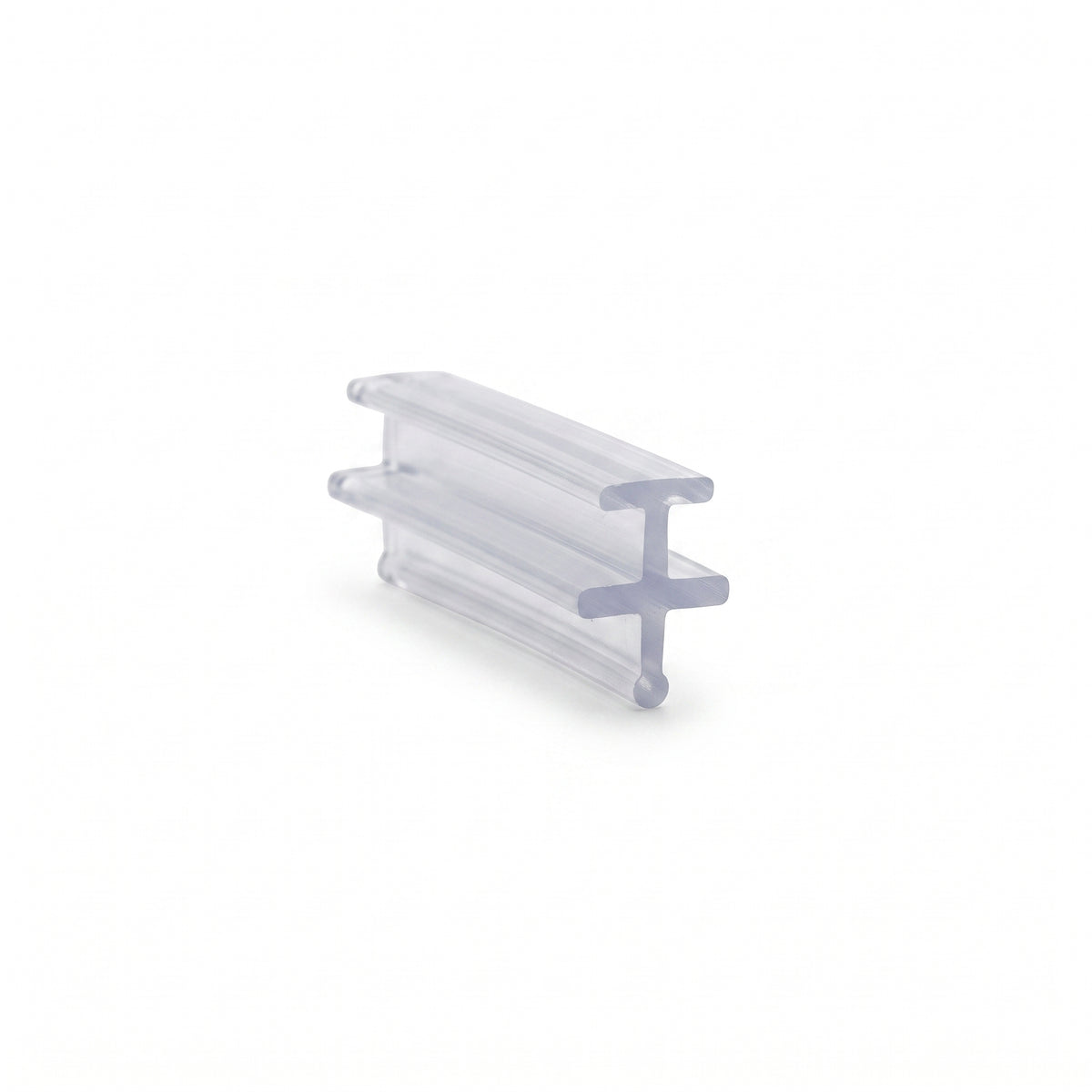 Clear seal offcut on white, an I-shaped section with a crossbar at each end of a central web