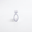 Clear 4.5mm T-head seal cut piece end-on against white, hollow oval loop below the T-stem