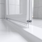 Clear seal with a curved sweeping blade under a folded white bifold door, meeting a white tray