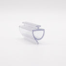 Clear seal offcut angled on white, slim T-head above a hollow half-round cup with a short tail fin