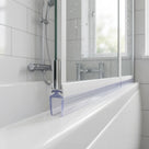 Clear seal with a deep bucket-shaped body under a white bath screen rail, chrome hinge above
