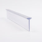 Clear seal length lying angled on white, small T-foot running along the edge of a long flat blade
