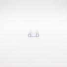 Clear seal cut piece end-on on white, two square glass channels side by side joined by a flat web
