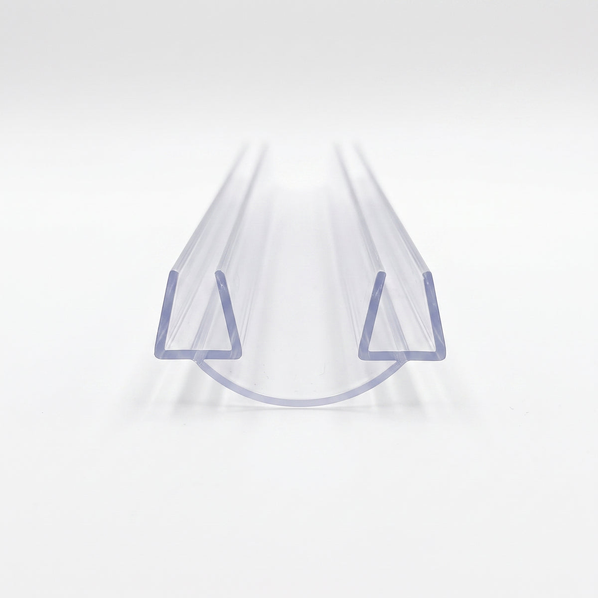 Clear glass-to-glass seal length end-on on white, deep U channels joined by a curved base membrane