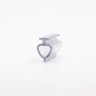 Clear seal offcut angled on white, T-head above a hollow teardrop loop tapering to a point