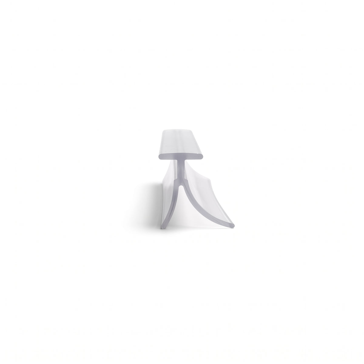 Clear seal offcut on white, small T-cap on a stem with a curved fin sweeping out beside a short leg