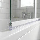 Clear push-in seal fitted into a 7-9mm recess on the bottom rail of a bifold bath screen