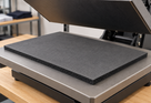 Illustrative textile heat press application with black high-recovery silicone sponge sheet, 915mm × 1m