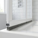 Brush seal with 5mm T backing and 6mm bristles fitted in the bottom channel of a bifold shower door