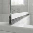 Brush seal with 6mm T backing and deep 12mm bristles bridging a large gap under a bifold bath screen