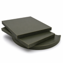 Two olive-green nylon slabs stacked on a round green disc, studio shot on white