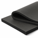 Black rubber sheet on white, one piece curled back over a flat sheet to show the cut edge