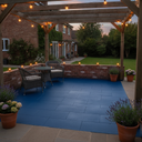 Dark blue anti-slip concrete floor and patio paint on a UK garden patio in the evening