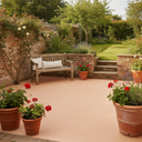 Sandstone anti-slip concrete floor and patio paint on a UK garden patio with terracotta pots
