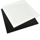 Square white polypropylene sheet resting on a black one, both on a white background