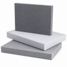 Three polyethylene foam slabs stacked on white, two grey and one white, fine closed-cell cut faces