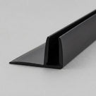 Matte black PVC fin seal on pale grey, angled along its length - U-channel with a flat side fin