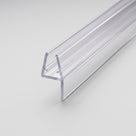 Length of clear seal on white, glass channel with a straight fin in line with one channel wall