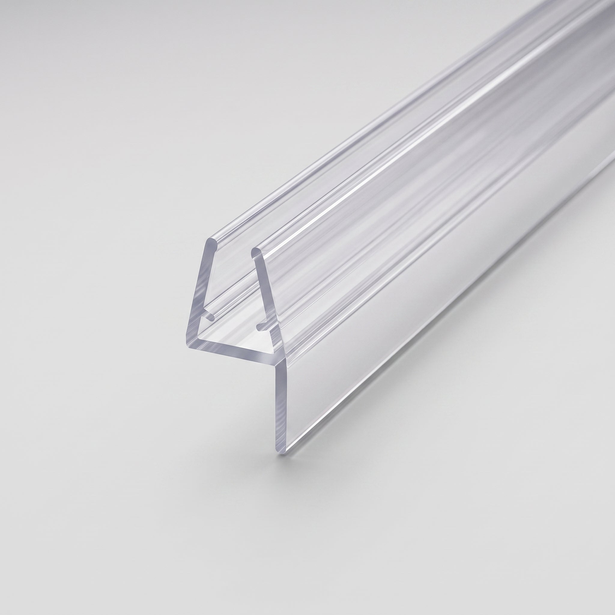 FIN008 clear profile - U-channel with gripping nibs and soft fin in line with one channel wall