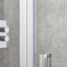 Clear self-adhesive vertical seal fitted to shower door frame upright - no tape visible when installed