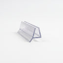 Clear seal offcut on white, trapezoid glass channel with a short rigid angled fin at the base