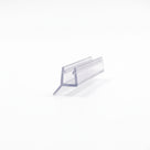 Clear seal offcut on white, glass channel with a short rigid fin angled off the corner