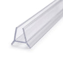 Clear seal receding on white, wedge-shaped glass channel with a rigid fin meeting it at a sharp corner point