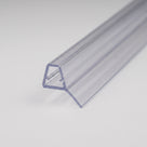 Length of clear seal on white, glass channel with a soft fin angled out from the channel base