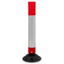 Red and white flexible traffic delineator post with reflective sleeve and black rubber base, on a white background