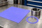 Illustrative gasket fabrication with lavender fluorosilicone sheet, 200 × 200mm