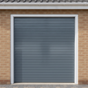 Mid grey gloss paint freshly applied to an up-and-over garage door on a UK house