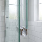 Clear U-section seal on thick 8-10mm glass closing a gap of up to 24mm to the adjacent panel