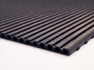 Close-up of the cut edge showing the 10mm profile and the hollow tubular chambers inside each rib