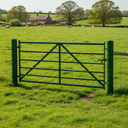 Dark Green gloss machinery enamel paint applied to a metal farm gate in a UK pasture