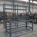 Mid Grey gloss machinery enamel paint applied to a steel workbench frame in a UK workshop