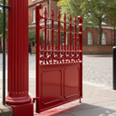 Post Office Red gloss machinery enamel paint applied to a cast-iron estate gate in the UK