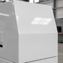 White gloss machinery enamel paint applied to a clean equipment casing in a UK factory unit