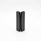 Two short black seal offcuts stood upright on white, meeting face to face down the centre join