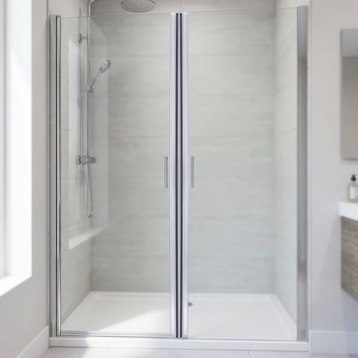 Two glass shower doors closed side by side in a pale-tiled bathroom, seal not visible at this distance
