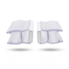 Two clear magnetic seal profiles side by side on white, white magnet blocks facing each other