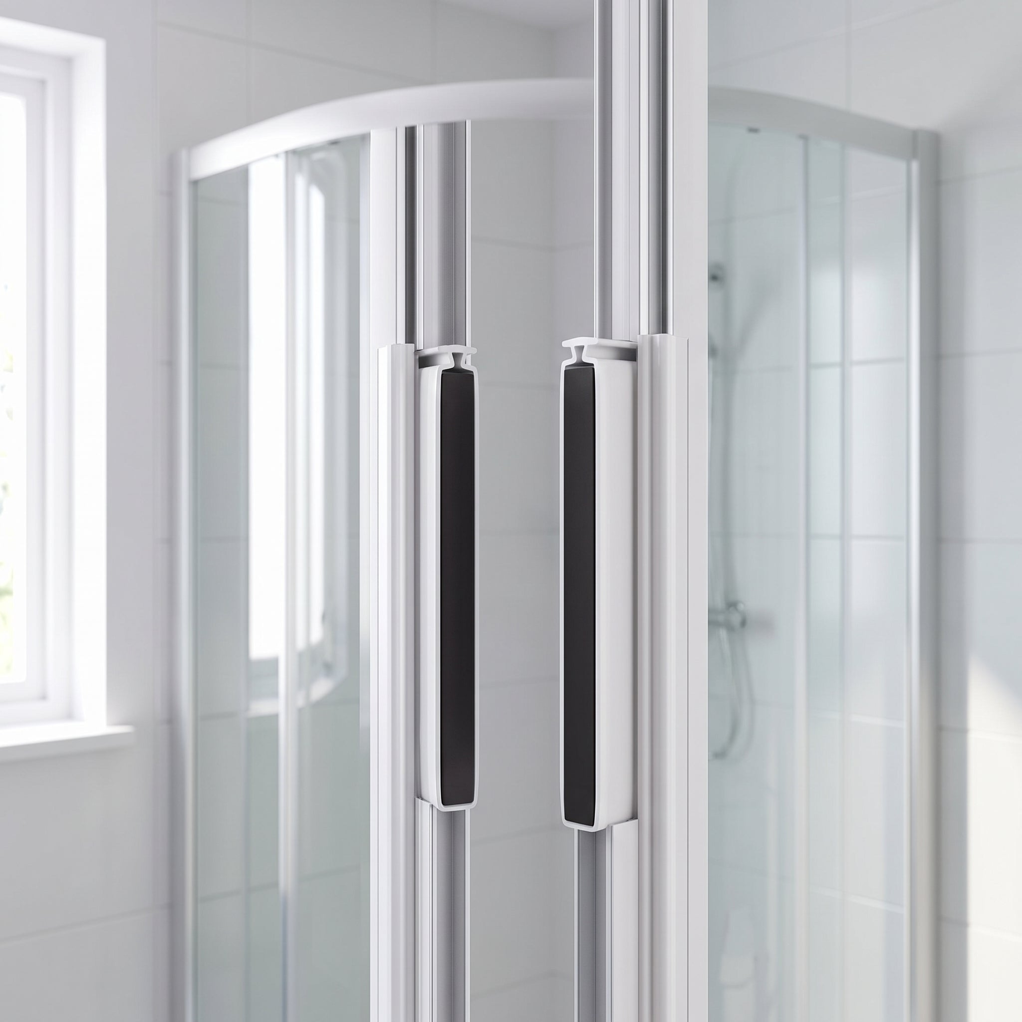 Pair of white magnetic channel seals fitted vertically on the meeting edges of a quadrant shower door