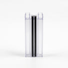 Two clear magnetic seal profiles snapped together on white, black magnet strips meeting inline, end-on view