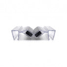 Two clear magnetic seal profiles meeting at an angle on white, black magnets tilted face to face