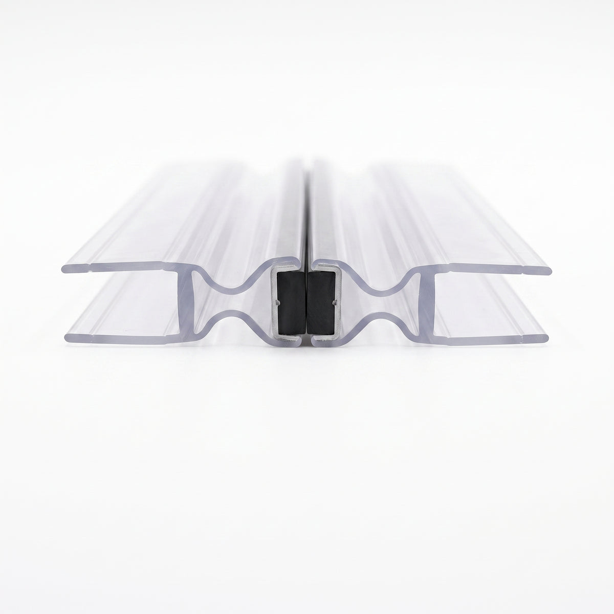 Two clear magnetic seal profiles closed on white, concertina webs and a black magnet pair at the centre