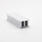 Two white seal offcuts on white, set side by side with their black magnet strips facing each other