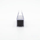 Magnetic shower seal seen end-on on white - clear glass channel with a square black magnet block