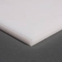 Small milky white HDPE sheet angled on a grey backdrop, two clean-cut edges meeting at the near corner