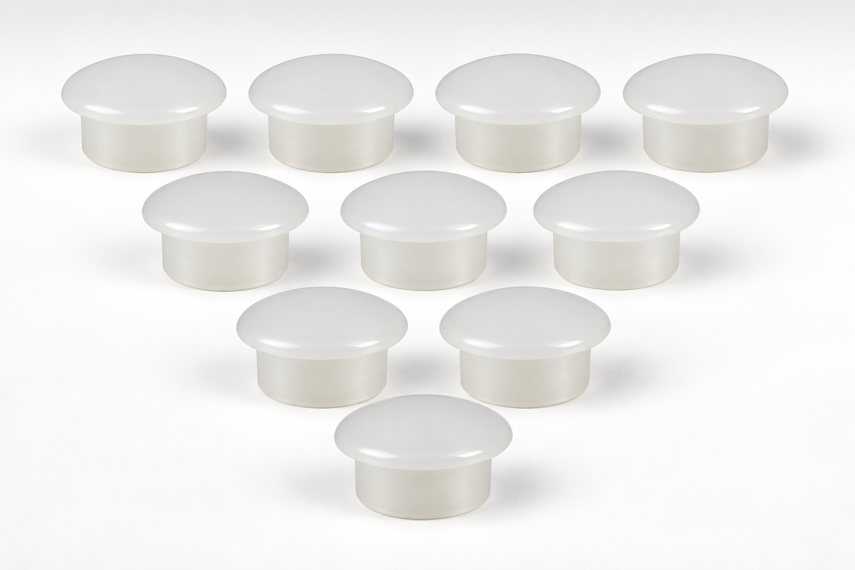 Ten natural LDPE domed push-in plugs, 27.1mm nominal size