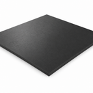 Charcoal-black cast nylon 6 panel on white, nearest corner forward, faint mottling across the matt face
